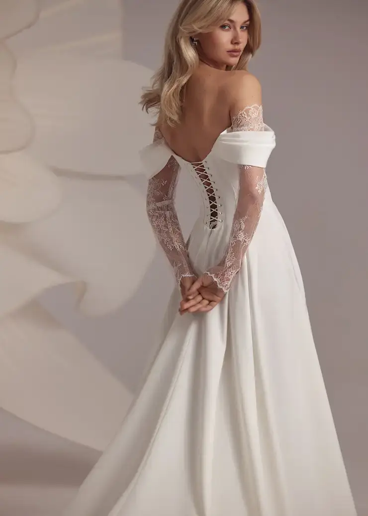 Model wearing a white bridal gown